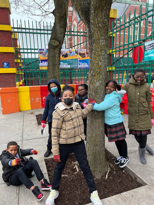 youth group celebrating tree care event