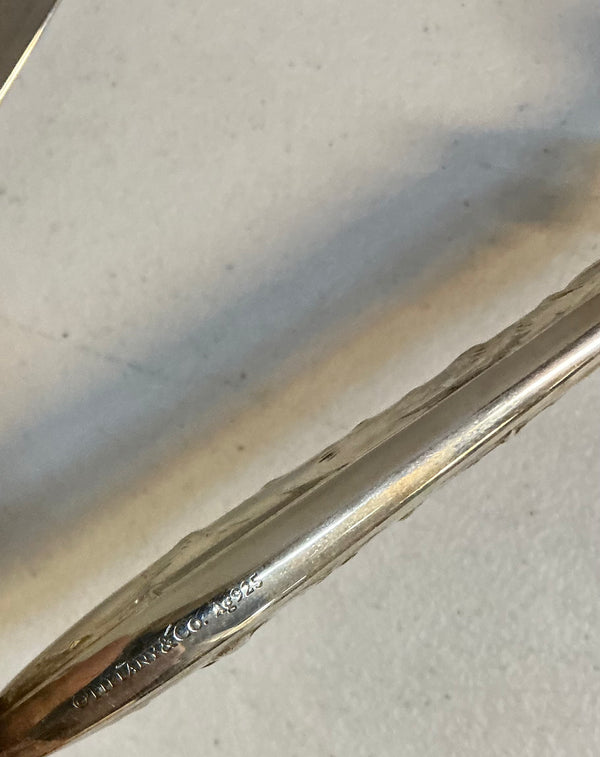 Tiffany and co Sterling Silver are stainless steel cheese knives