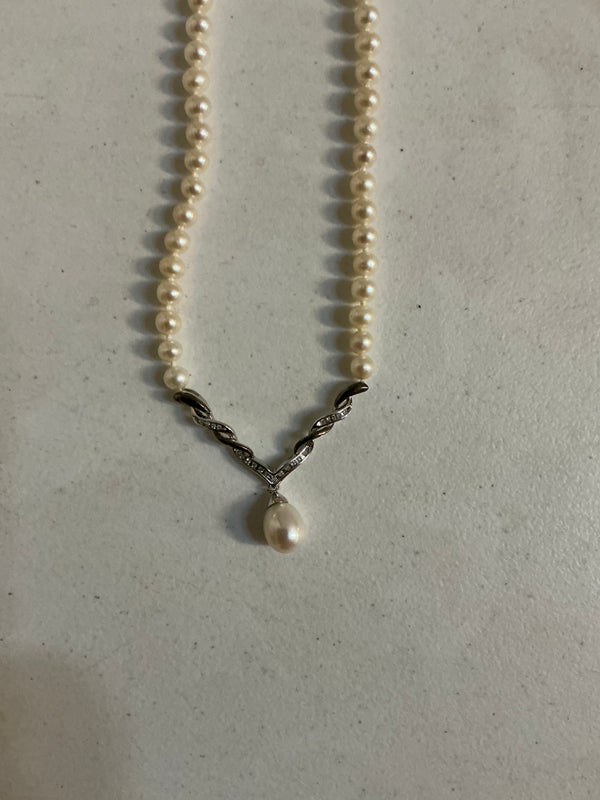 Pearl and Sterling are 14k gold necklaces