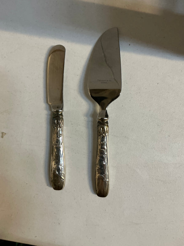 Tiffany and co Sterling Silver are stainless steel cheese knives