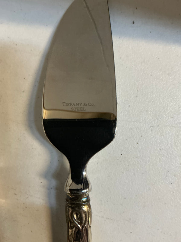 Tiffany and co Sterling Silver are stainless steel cheese knives