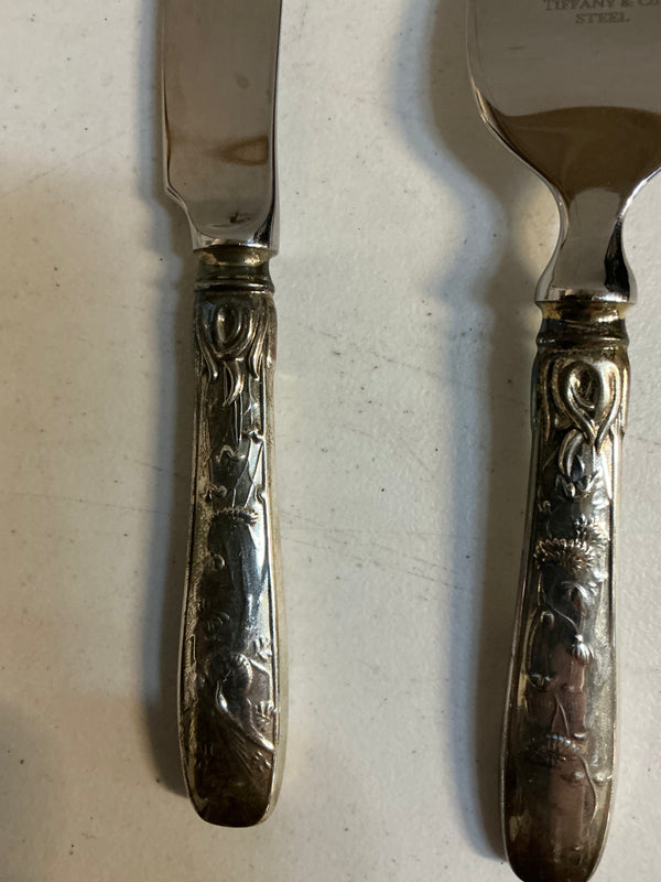 Tiffany and co Sterling Silver are stainless steel cheese knives