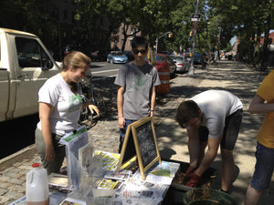 volunteers doing compost outreach