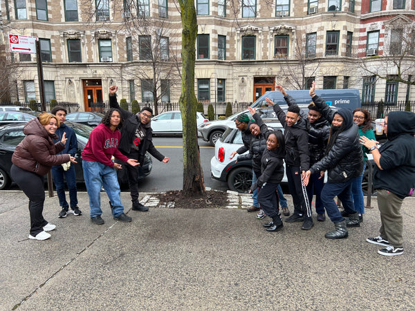 volunteer group celebrating finishing the tree care